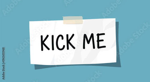 Humorous note with text kick me on white paper stuck to blue background with tape