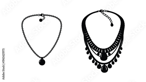 Two black necklaces displayed showcasing distinct chain and pendant designs silhouette