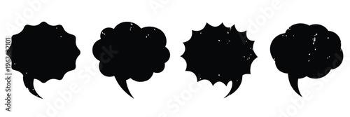 Four black ink blots on a white background