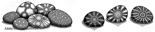 Collection of hand drawn decorative stones with intricate dot patterns and tribal mandalas
