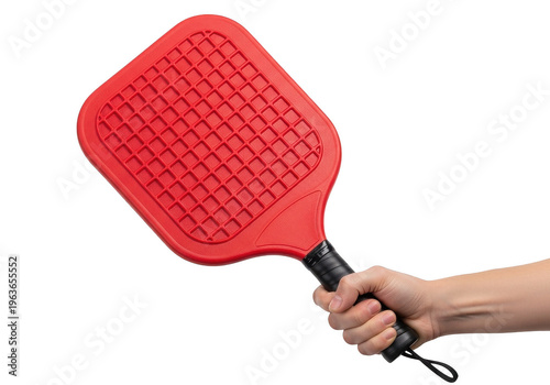 A red paddleball racket held by a hand for playing paddleball sports