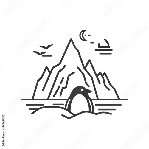 A solitary penguin stands facing majestic mountains under a night sky