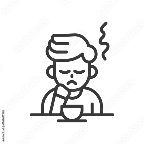 A person with a sad expression having a hot beverage