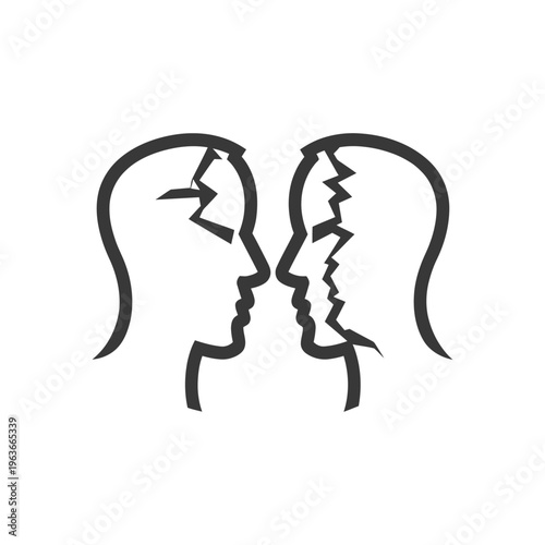 Two human head silhouettes facing each other with cracks shown