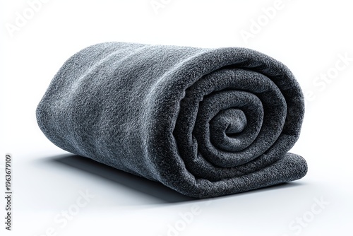 A rolled up grey blanket ready for use. Showing the texture and the material of the blanket in a minimalistic way.