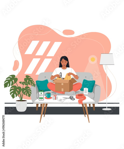 Happy woman unpacking freshly delivered online shopping purchase while relaxing comfortably at home