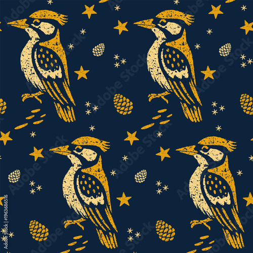 Repeating block print pattern featuring woodpeckers, pine cones, and stars in textured yellow and blue colors.