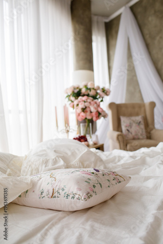 bright spring bedroom interior with soft textiles and floral decor, natural light through curtains, cozy elegant space with calm and romantic atmosphere