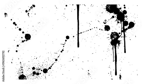 Abstract ink splats and vertical liquid paint drips on white background