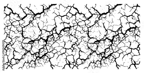 Complex pattern of cracked dry earth and shattered soil surface