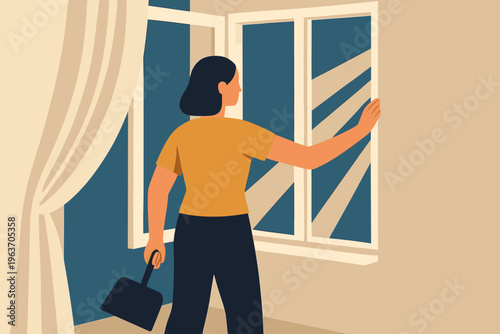 Woman opening window for fresh air after party, holding dustpan