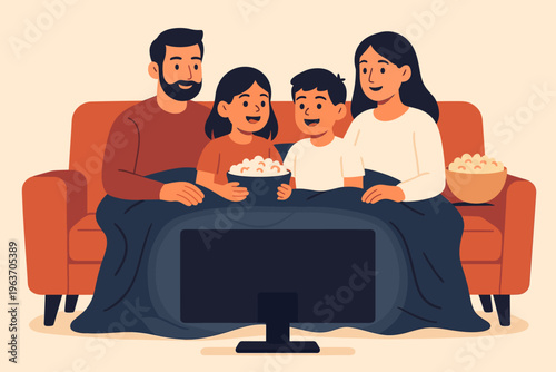 Happy family enjoying movie night together on the couch with popcorn