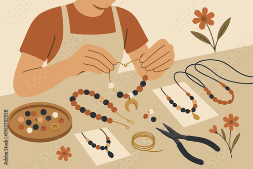 Person crafting handmade jewelry with beads, tools, and crescent moon charm