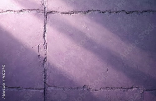 Cracked concrete panels painted in light and dark violet hues. Textured wall surface with diagonal light shadows offers ample copy space for design elements.
