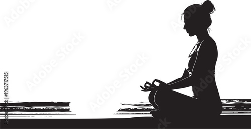Silhouette of a woman meditating in lotus position on a beach at sunrise or sunset, symbolizing peace and yoga.