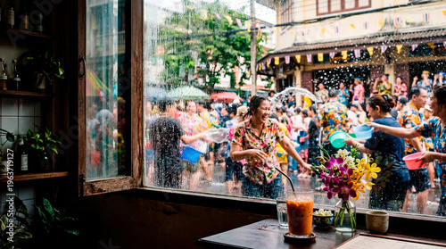 Asian vendor watching lively songkran street celebration