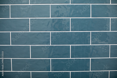 Fotografie Blue Subway Shower Tile with white grout on the wall