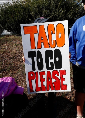 Photography Taco To Go sign at protest