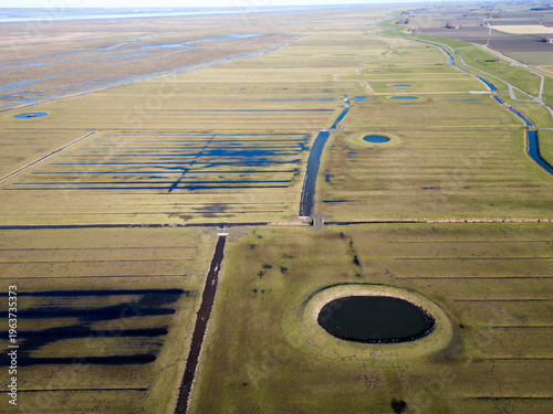 Aerial view of a traditional circular water reservoir or Dobbe water pond in Friesland, The Netherlands