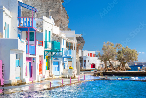 Vibrant fishing village of Klima with white houses and colorful doors on Milos Island in Greece