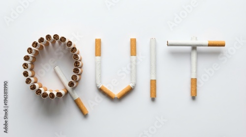 Quit Smoking Concept Spelled With Cigarette Letters On White Background.
