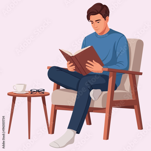 Man relaxing in comfortable chair reading brown book with legs crossed.