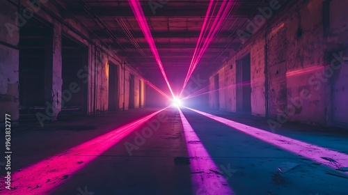 Abstract light beams cutting through an industrial interior space