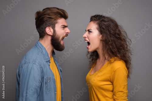Wallpaper Mural Young man and woman shouting at each other in heated argument, emotional confrontation and tense couple conflict Torontodigital.ca