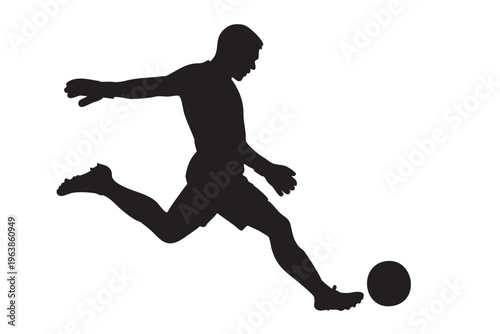Soccer player silhouette kicking the ball for a powerful goal or pass action.