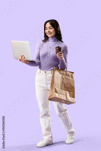 Beautiful woman with laptop...