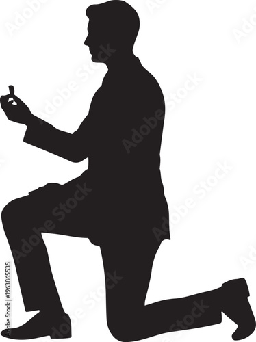 Silhouette of a man kneeling to propose with an engagement ring box