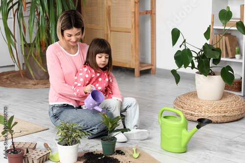 Happy mother and her little...