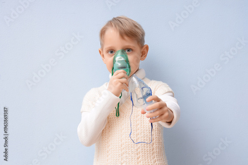 Cute little boy with nebuli...