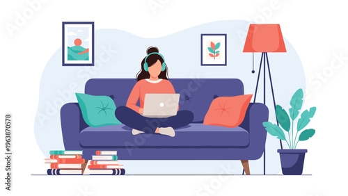 Young woman sitting on a comfortable sofa with headphones and laptop, enjoying music or online course in a cozy living room.