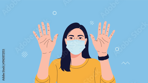 Young woman wearing a blue medical face mask and waving both her hands in a friendly greeting against a blue background.