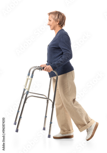 Mature woman using walking ...