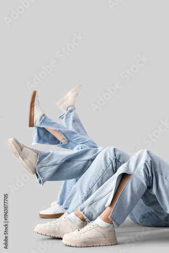 Female legs in jeans and st...