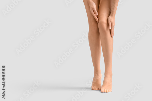 Woman with silky legs on li...