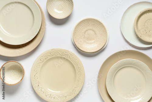 Set of beige plates and bow...