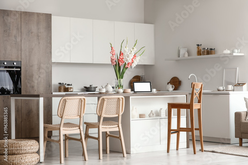 Interior of kitchen with ta...