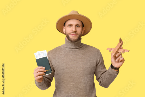 Young male tourist with pas...