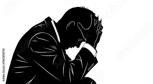 Man Sitting with Head in Hands.