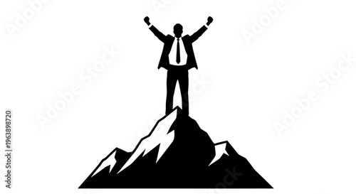 Man Standing on Mountain Peak Arms Raised.