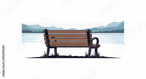 A lonely wooden bench sits on a grassy shore overlooking a serene lake and distant mountains