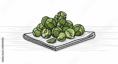 A pile of fresh brussels sprouts rests on a folded checkered cloth