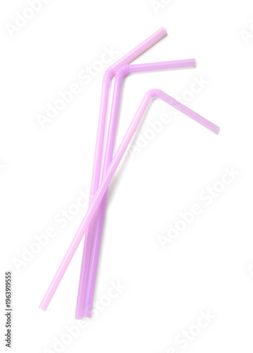 Purple plastic straws on wh...