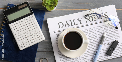 Cup of coffee, newspaper an...