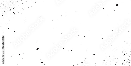 Black ink splatter texture on white background with scattered dust particles