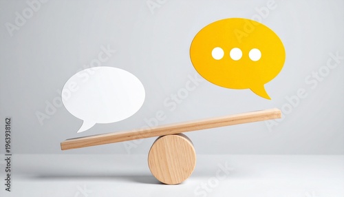 Wooden seesaw with speech bubbles symbolizing balanced communication