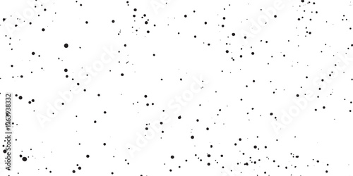Black ink splatter texture with scattered dots on a white background